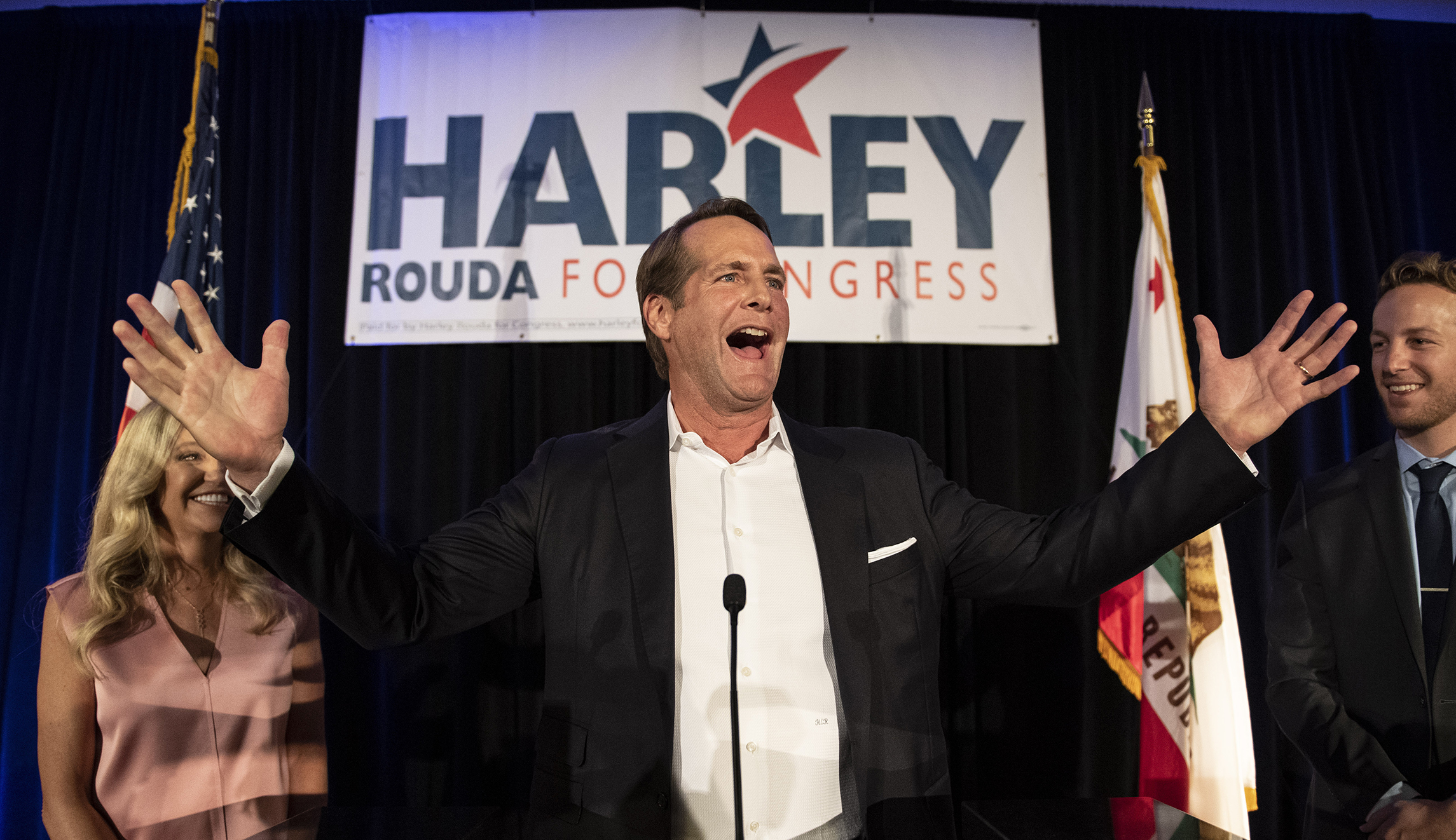 Harley Rouda, Democratic congressional candidate in the 48th district, addresses his supporters at an election party.