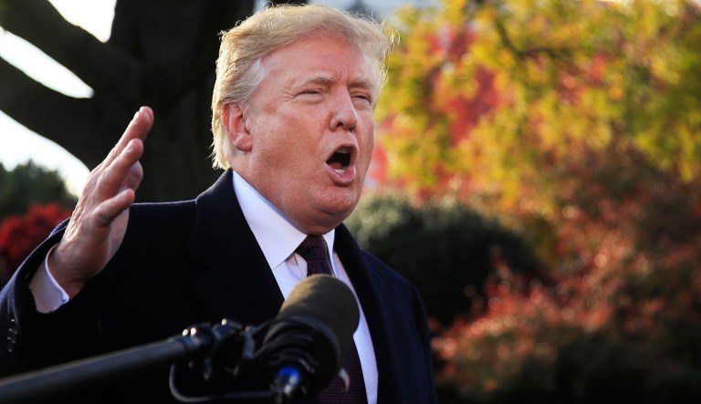President Donald Trump speaks to the media before leaving the White House in Washington, Tuesday, Nov. 20, 2018, to travel to Florida, where he will spend Thanksgiving at Mar-a-Lago.