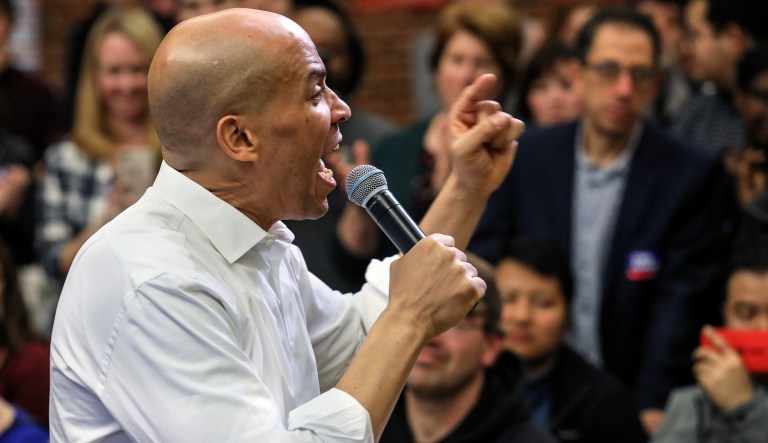 No, Cory Booker’s plan is not ‘reparations’ FILE - In this Oct. 28, 2018, file photo, New Jersey Sen. Cory Booker speaks at a get out the vote event hosted by the New Hampshire Young Democrats in Durham, N.H. As Democrats begin to think about the 2020 presidential race, they face a choice between pragmatists who may be able to flip states that President Trump won in 2016 and those such as Booker, Sen. Kamala Harris of California, or Beto O'Rourke of Texas, whose inspirational personal stories may connect with voters on a more emotional level.