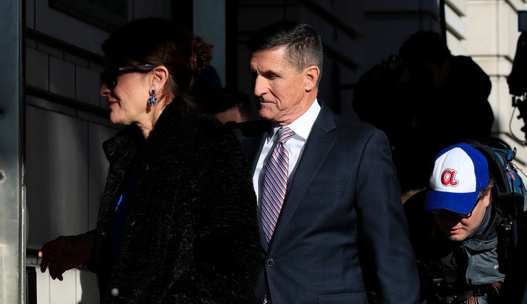 President Trump's former national security adviser, Michael Flynn, who pleaded guilty to lying to the FBI about his contacts with Russia during the presidential transition, arrives with his wife Lori Andrade, for his sentencing at the U.S. District Court in Washington, Tuesday, Dec. 18, 2018. 