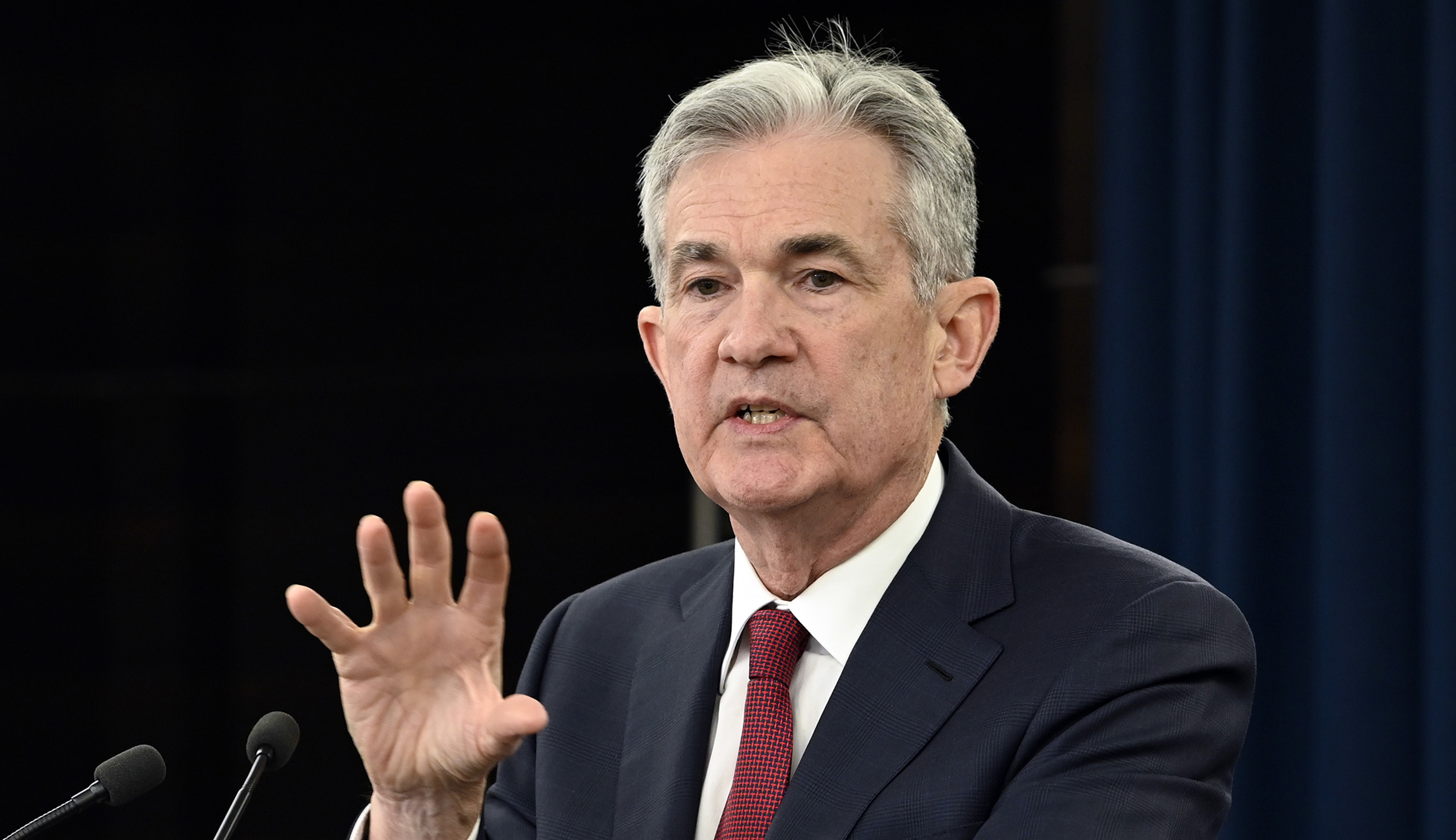 Fed holds interest rates steady as it eyes future tapering