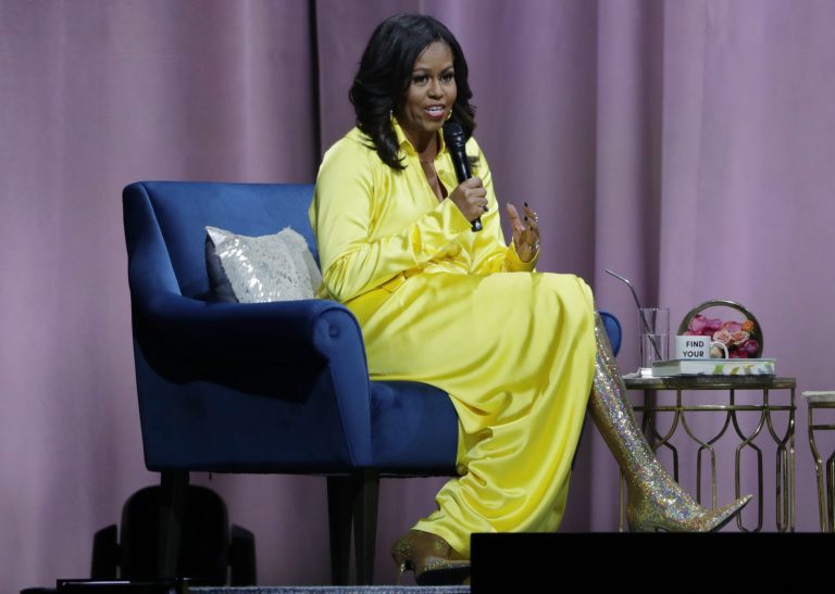 Former first lady Michelle Obama speaks as she is interviewed by Sarah Jessica Parker during an appearance for her book.