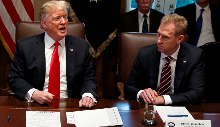 Acting Secretary of Defense Patrick Shanahan, right, listens as President Donald Trump speaks during a Cabinet meeting at the White House, Wednesday, Jan. 2, 2019, in Washington.
