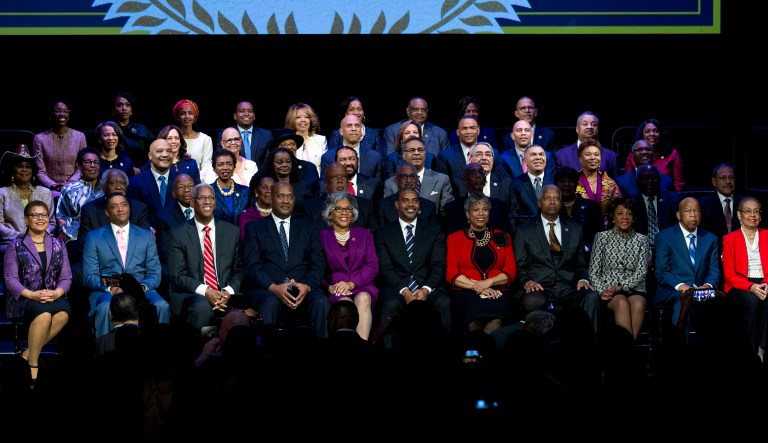 Members of the Congressional Black Caucus participate in an event.