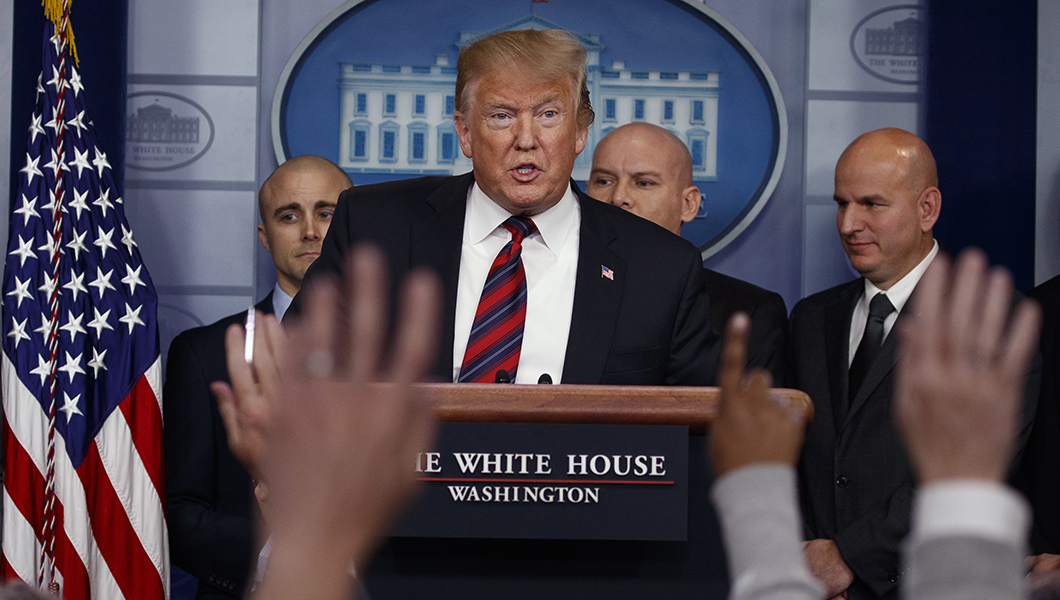 Trump pitches border wall in counterprogramming move on day Pelosi becomes speaker