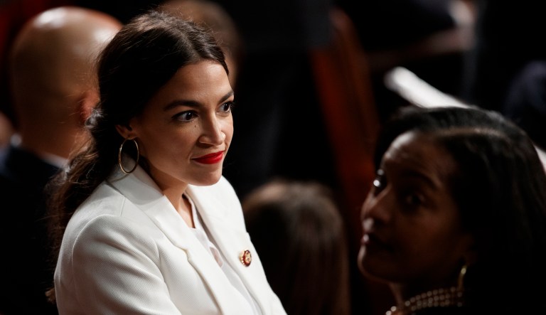 Rep. Alexandria Ocasio-Cortez, D-N.Y., and Rep. Jahana Hayes, D-Conn., stand together on the House floor at the U.S. Capitol in Washington, Thursday, Jan. 3, 2019, on the first day of the 116th Congress with Democrats holding the majority.