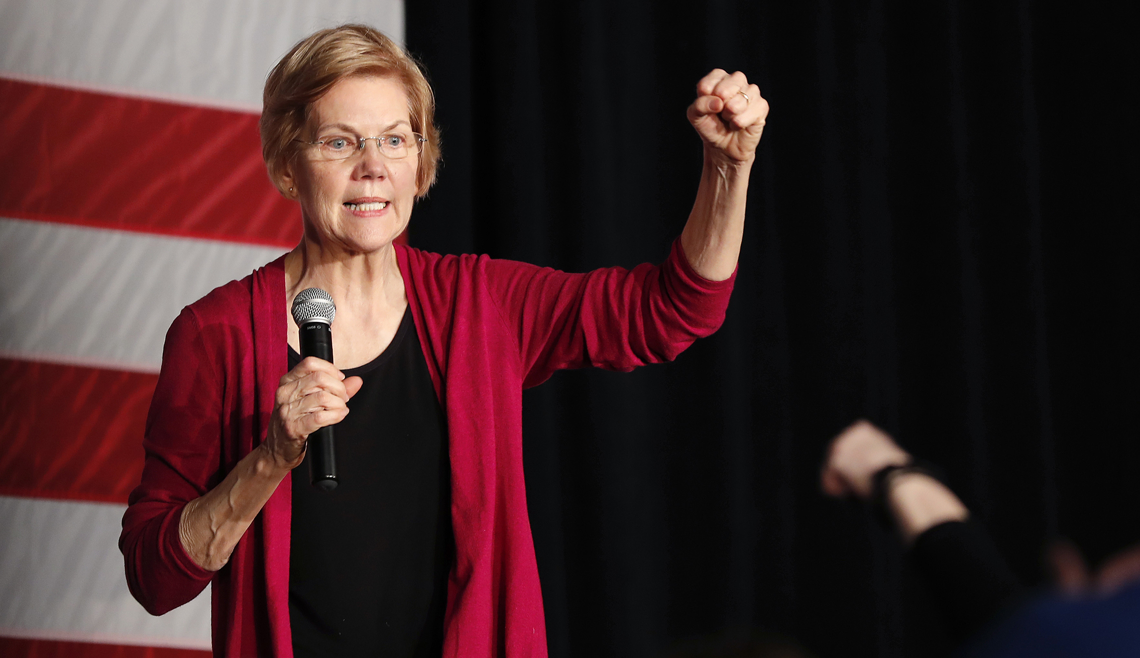 Warren spurns ‘socialism’ in favor of ‘capitalism with serious rules’