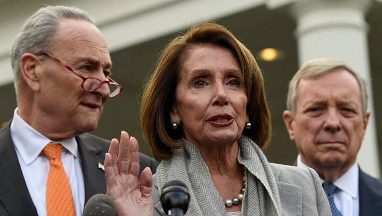 House Speaker Nancy Pelosi of Calif., center, speaks about her oath of office as she stands next to Senate Minority Leader Sen. Chuck Schumer of N.Y., left, and Sen. Dick Durbin, D-Ill., right, following their meeting.