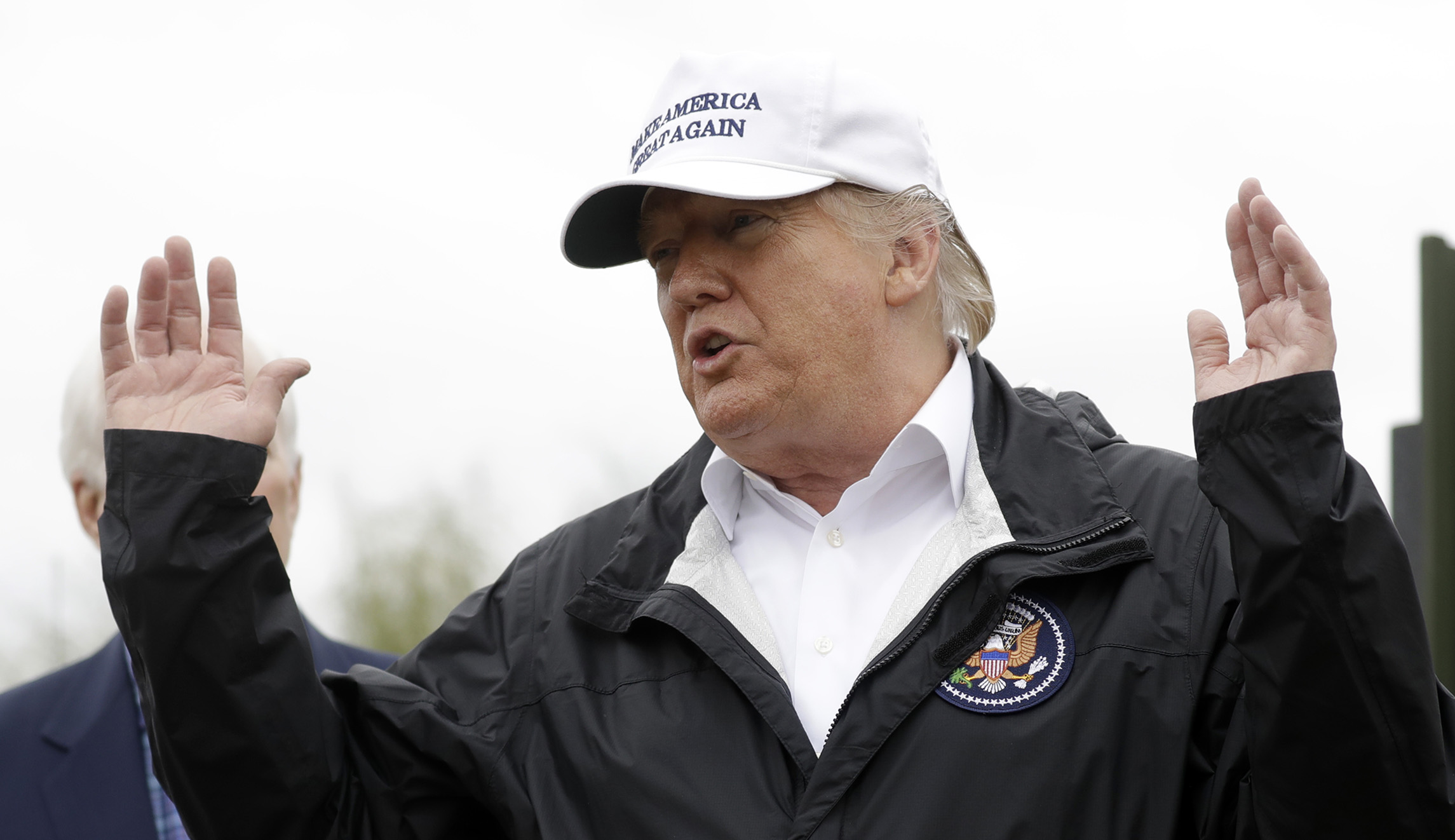 Trump eases off using disaster relief funds for his wall after bipartisan pushback