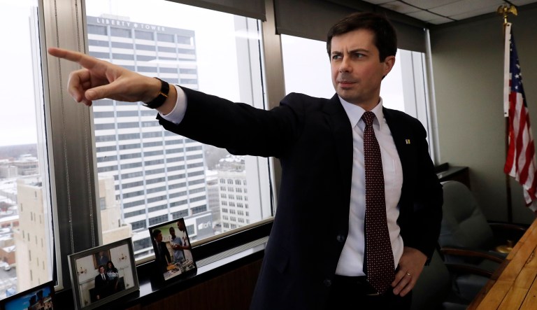 Mayor Pete Buttigieg points as he talks to an AP reporter at his office in South Bend, Ind., Thursday, Jan. 10, 2019. At 37, Pete Buttigieg is just a few years older than the minimum age required to serve as president of the United States.
