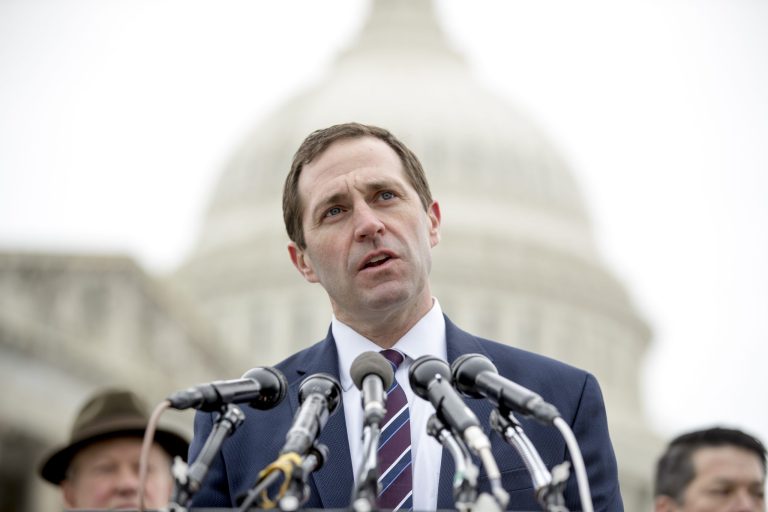 Rep. Jason Crow, D-Colo., speaks at a news conference.