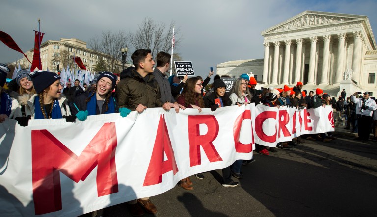 Anti-abortion activists march outside of the U.S. Supreme Court, during the March for Life in Washington Friday, Jan. 18, 2019.