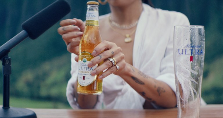 This undated image provided by Michelob ULTRA Pure Gold shows a scene from the company's 2019 Super Bowl NFL football spot starring Zoe Kravitz.