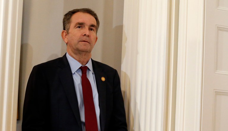 Virginia Gov. Ralph Northam arrives for a news conference in the Governor's Mansion in Richmond, Va.