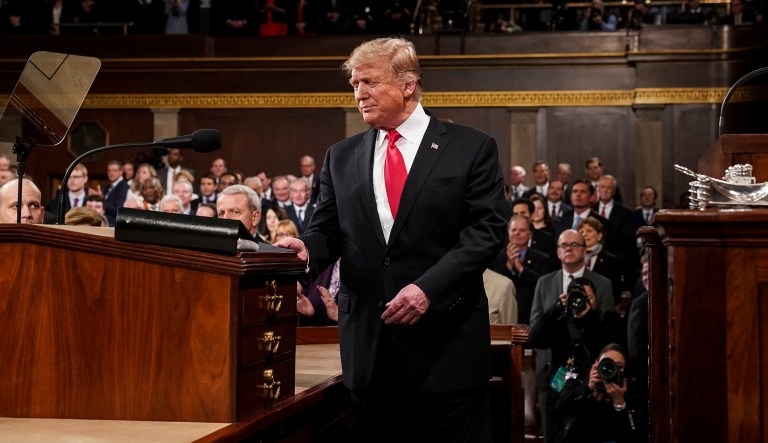 President Trump arrives in the House chamber before giving his State of the Union address.