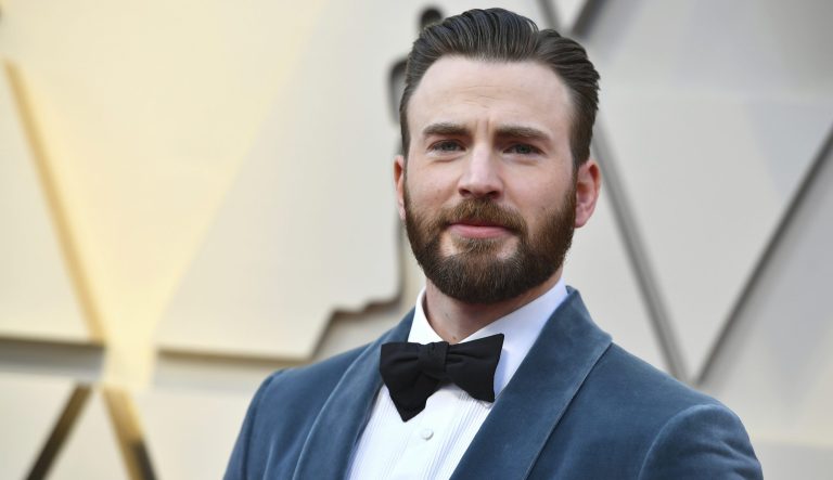 Chris Evans arrives at the Oscars on Sunday, Feb. 24, 2019, at the Dolby Theatre in Los Angeles. 