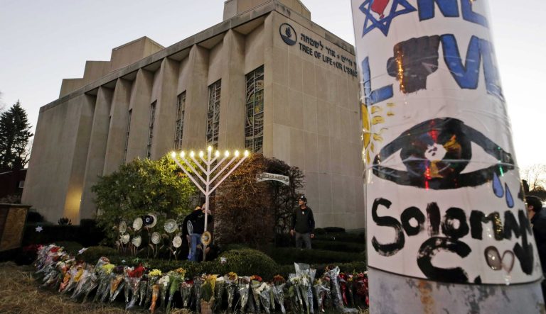 In this Dec. 2, 2018 photo, a menorah is tested outside the Tree of Life Synagogue in preparation for a celebration service at sundown on the first night of Hanukkah, in the Squirrel Hill neighborhood of Pittsburgh. 