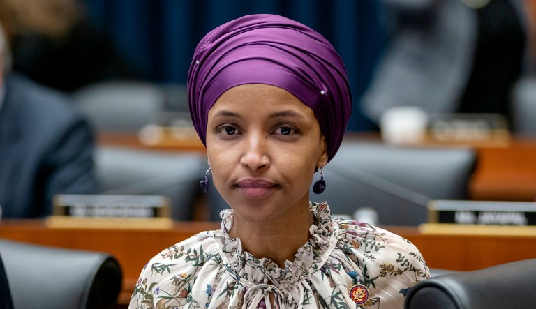 Rep. Ilhan Omar, D-Minn., sits during a hearing.