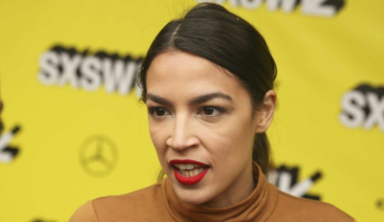 Alexandria Ocasio-Cortez arrives for the world premiere of "Knock Down the House" at the Paramount Theatre.