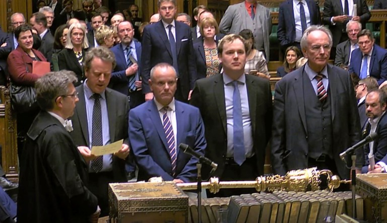 In this grab taken from video, MPs announce the result of the Brexit vote where the motion to allow Britain's Prime Minister Theresa May to request a one-off extension ending June 30 was passed by 412 votes to 202 in London.