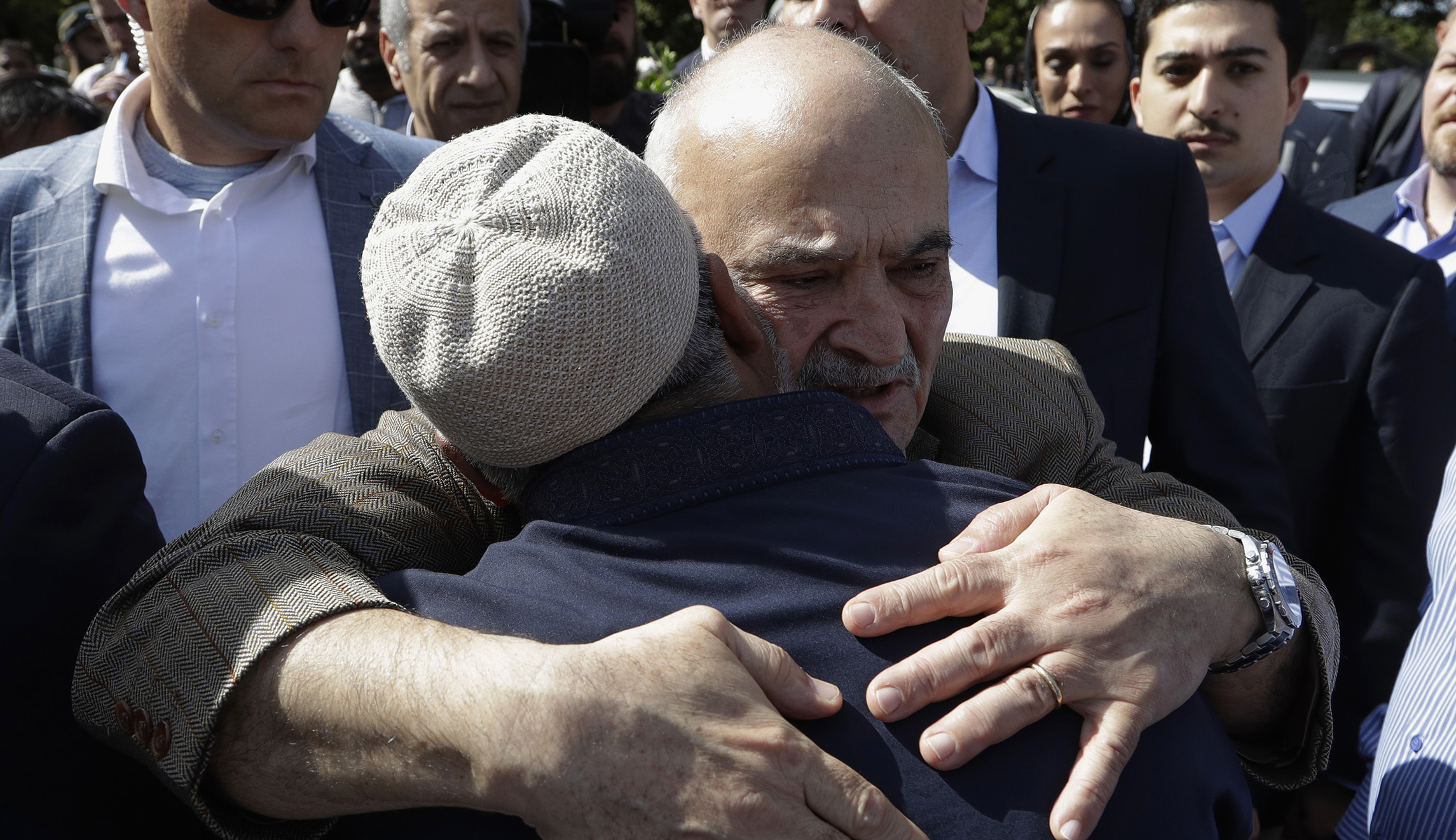 His Royal Highness Prince Hassan bin Talal Hashemite, of the Kingdom of Jordan, embraces a worshipper outside the Al Noor mosque in Christchurch, New Zealand, Saturday, March 23, 2019. The mosque reopened today following the March 15 mass shooting.