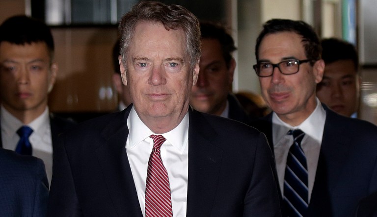 U.S. Trade Representative Robert Lighthizer and U.S. Treasury Secretary Steven Mnuchin arrive at a hotel in Beijing, Thursday, March 28, 2019. Mnuchin and his Trade Representative Robert Lighthizer arrive at China's capital to hold a new round of high-level trade talks with China on March 28-29, start with a working dinner.