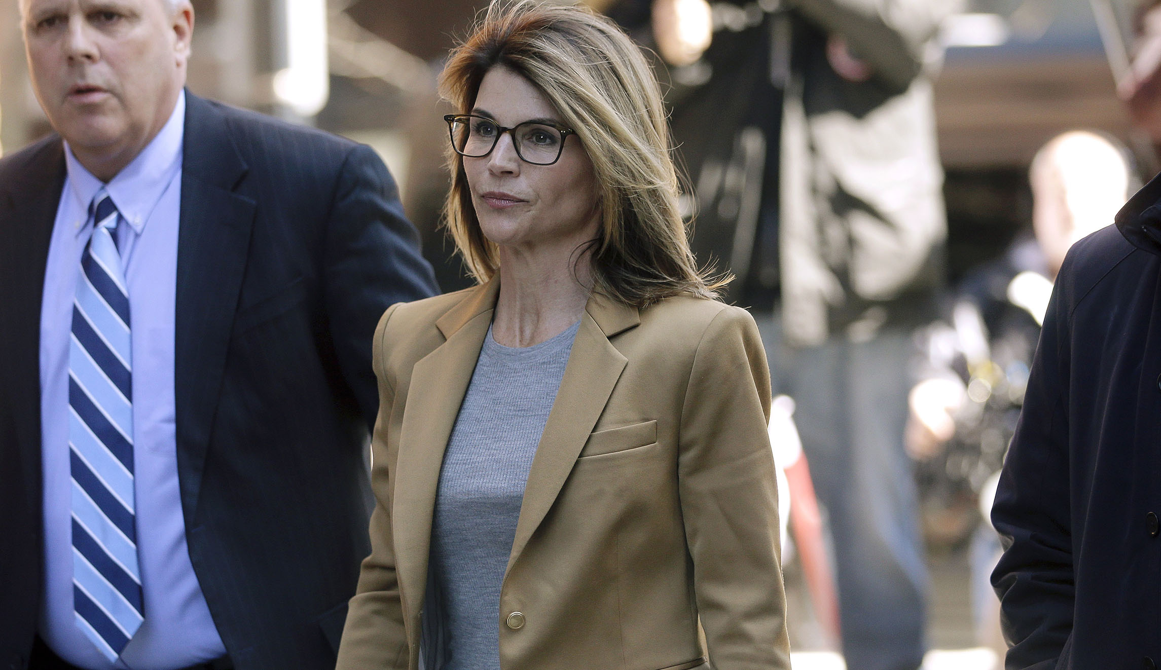 Lori Loughlin indicted again on charges of conspiring to commit fraud, money laundering