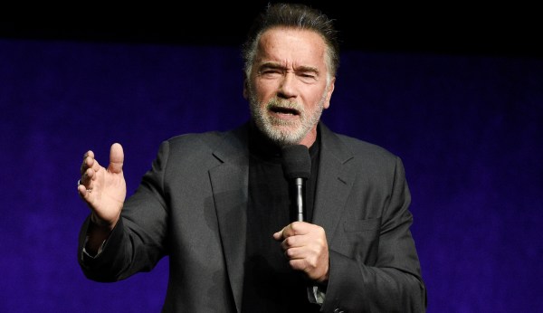 WATCH: Arnold Schwarzenegger kicked from behind