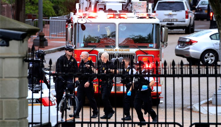 Uniformed Secret Service police officers are viewed on Pennsylvania Avenue as seen from inside the White House North Lawn in Washington, Friday, April 12, 2019.
