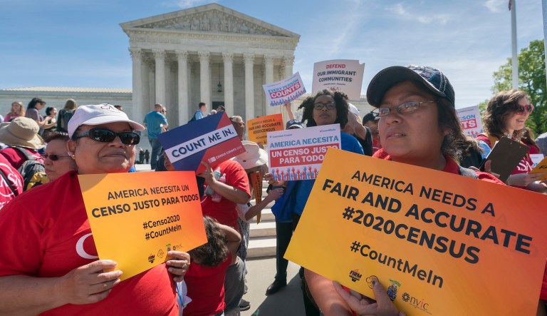 Immigration activists rally outside the Supreme Court as the justices hear arguments over the Trump administration's plan to ask about citizenship on the 2020 census, in Washington, Tuesday, April 23, 2019. Critics say the citizenship question on the census will inhibit responses from immigrant-heavy communities that are worried the information will be used to target them for possible deportation.