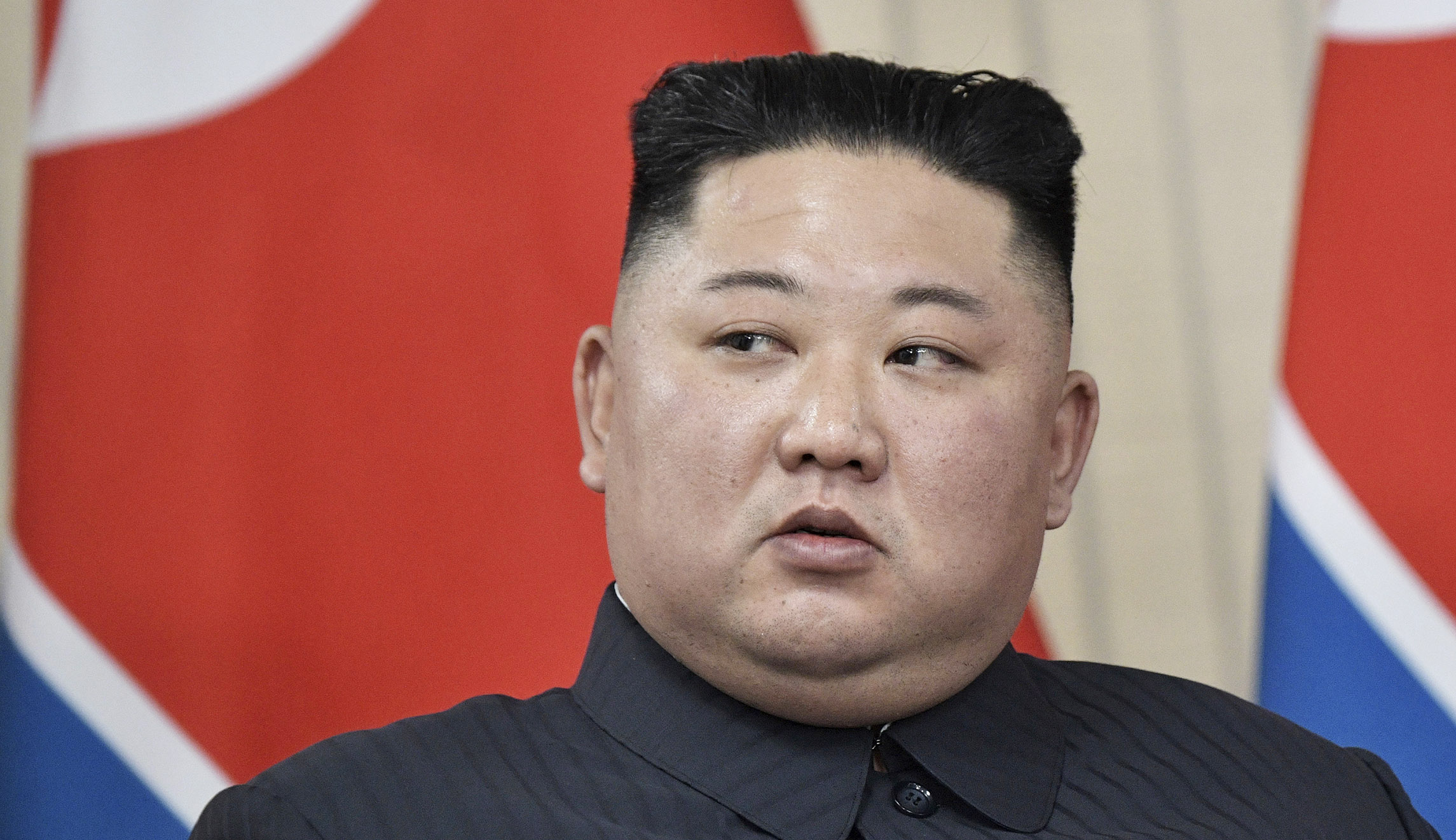 North Korea's leader Kim Jong Un appears at an event.