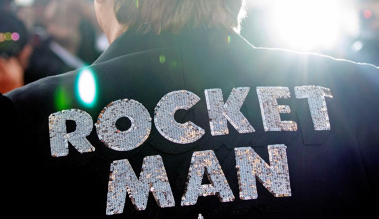 Musician Elton John poses for photographers upon his arrival at the premiere of the film "Rocketman" at the 72nd international film festival in Cannes, France, Thursday, May 16, 2019.