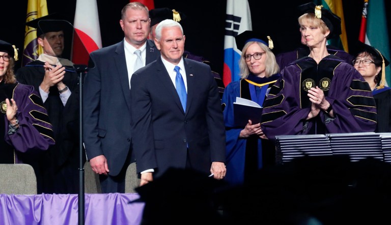 Vice President Mike Pence attends the Taylor University commencement Saturday, May 18, 2019 in Upland, Ind. Dozens of graduates and faculty have protested the selection of Vice President Mike Pence as the commencement speaker at Taylor University in Indiana by walking out moments before his introduction.