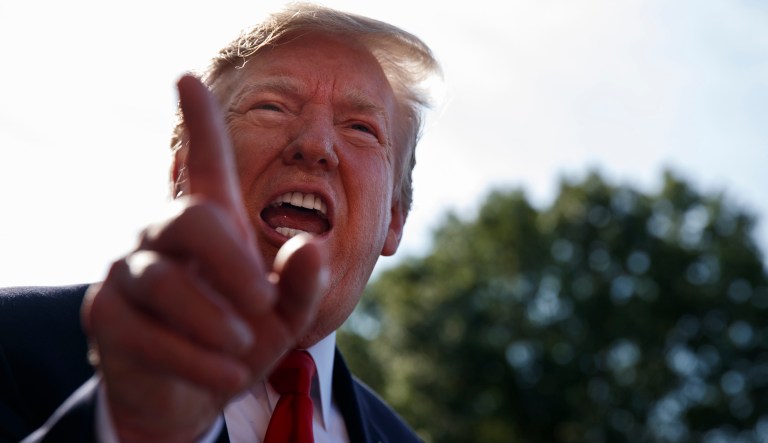 President Donald Trump talks with reporters before departing on Marine One for the Air Force Academy graduation ceremony, Thursday, May 30, 2019, in Washington.