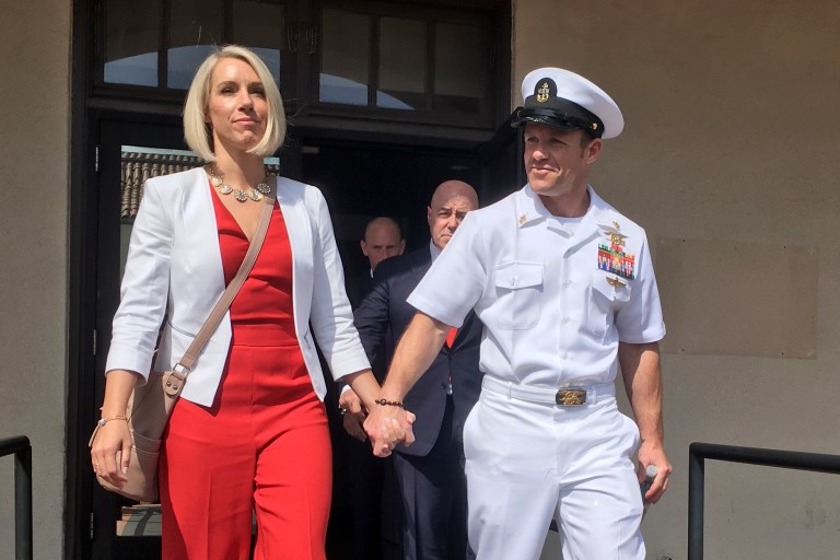 Edward Gallagher leaves a military courtroom with his wife, Andrea Gallagher.