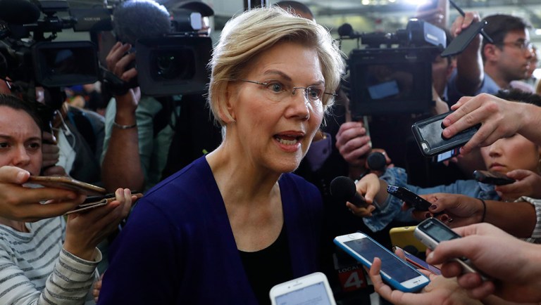 Democratic presidential candidate Sen. Elizabeth Warren, D-Mass., talks with reporters.