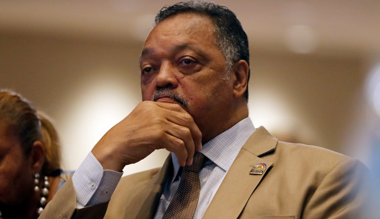 Rev. Jesse Jackson watches as Democratic presidential candidate Pete Buttigieg speaks during the African American Leadership Summit Thursday, June 6, 2019, in Atlanta.