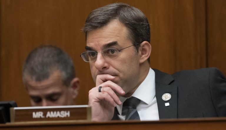 Rep. Justin Amash, R-Mich., listens to debate as the House Oversight and Reform Committee considers whether to hold Attorney General William Barr and Commerce Secretary Wilbur Ross in contempt for failing to turn over subpoenaed documents related to the Trump administration's decision to add a citizenship question to the 2020 census, on Capitol Hill in Washington, Wednesday, June 12, 2019. 