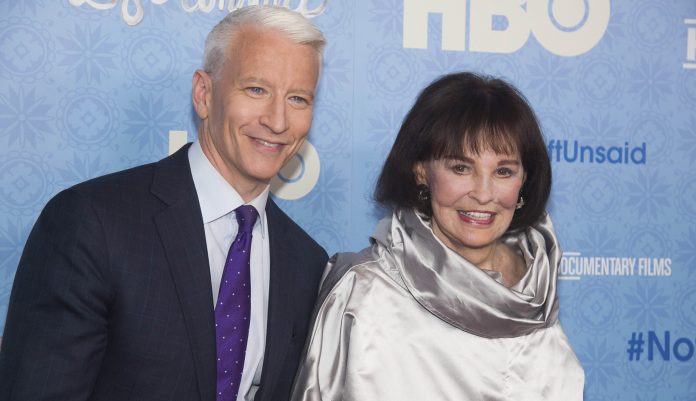 In this April 4, 2016 photo, CNN anchor Anderson Cooper and Gloria Vanderbilt attend the premiere of "Nothing Left Unsaid" at the Time Warner Center in New York. Vanderbilt, the heiress and the designer jeans queen of the 1970s and '80s, died on Monday, June 17, 2019, at 95, according to her son, Cooper. 