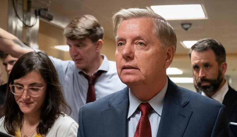 Senate Judiciary Committee Chairman Lindsey Graham, R-South Carolina, is questioned by reporters in Washington.