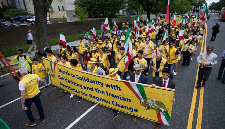 Activists march from the State Department to the White House to call for regime change in Iran, Friday, June 21, 2019, in Washington.