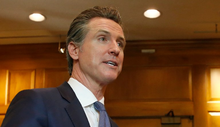 California governor Gavin Newsom appears to the press.