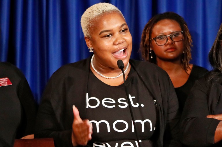 In this May 7, 2019 photo Rep. Erica Thomas, D-Austell, speaks during a news conference in Atlanta. Thomas says she was verbally attacked in a supermarket by a white man who told her, "Go back where you came from." 