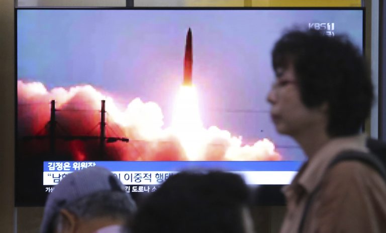 A TV screen shows an image of North Korea's missile launch during a news program at the Seoul Railway Station in Seoul, South Korea, Friday, July 26, 2019. 