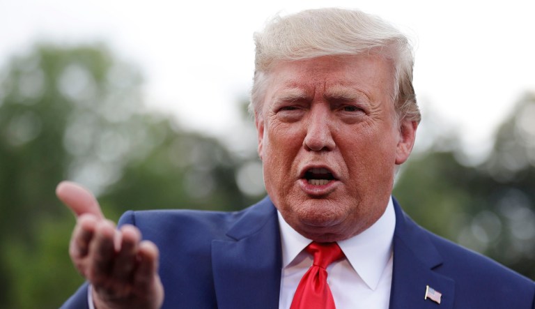 President Trump talks to reporters.