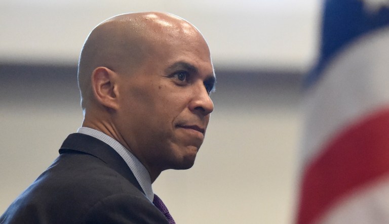 Democratic presidential candidate and New Jersey Sen. Cory Booker waits to speak at a campaign event.