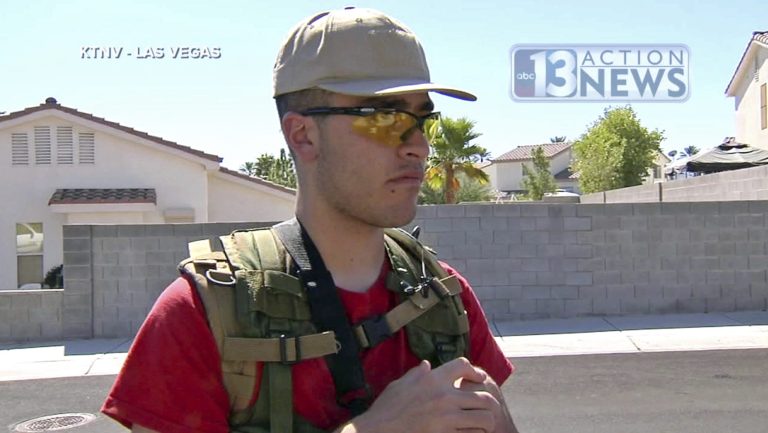 This Sept. 22, 2016, photo from video from KTNV 13 Action News shows Conor Climo during an interview while walking a Las Vegas neighborhood, heavily armed.