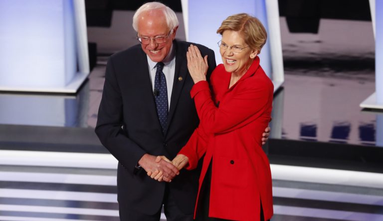 Sen. Bernie Sanders, I-Vt., and Sen. Elizabeth Warren, D-Mass., participate in the first of two Democratic presidential primary debates hosted by CNN Tuesday, July 30, 2019, in the Fox Theatre in Detroit. 