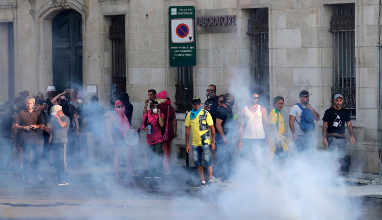 Police use tear gas against protesters in Bayonne, France, on Saturday.