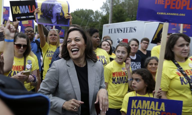 Democratic presidential candidate Sen. Kamala Harris, D-Calif. marches with her supporters at the Polk County Democrats Steak Fry, in Des Moines, Iowa, Saturday, Sept. 21, 2019.